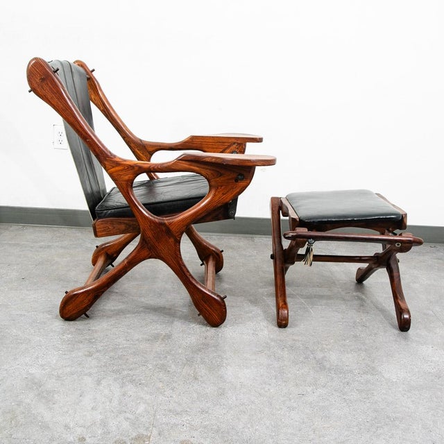 Named the 'Swinger Chair' for its pivoting mechanism that allows you to swing in your seat, this incredible rosewood and...