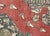 Handwoven wool-on-wool Oushak rug from vintage Turkey, measuring 4'10" x 7'4". Originating from the storied weaving...
