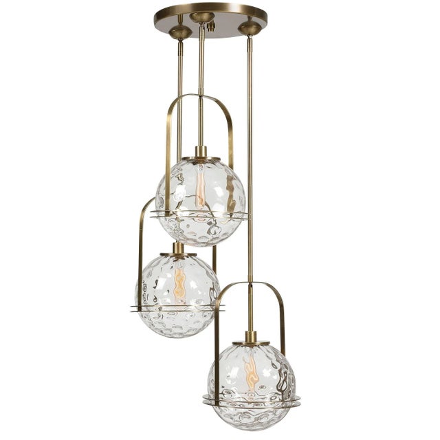 Soft Contemporary Lines Anchor These Oversized Floating Spheres Of Clear Watered Glass All Enhanced With Rich Antique...