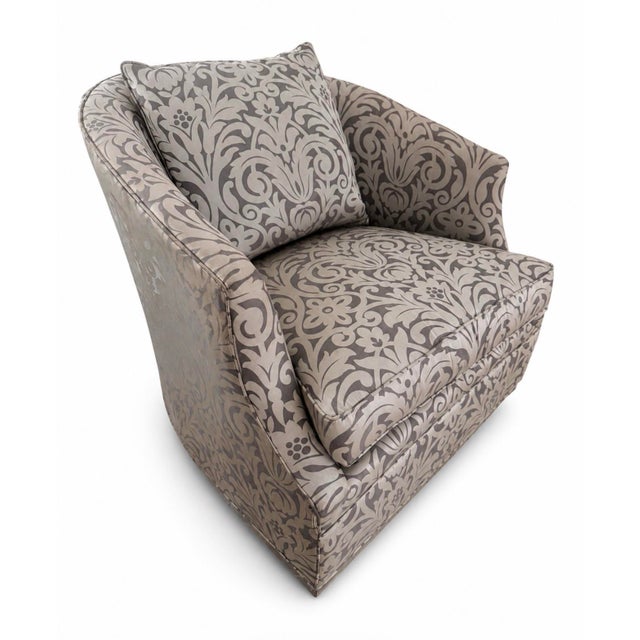 Comfortable pair of vintage Thomasville swivel lounge chairs with softly curved backs, generous loose seat cushions, and...