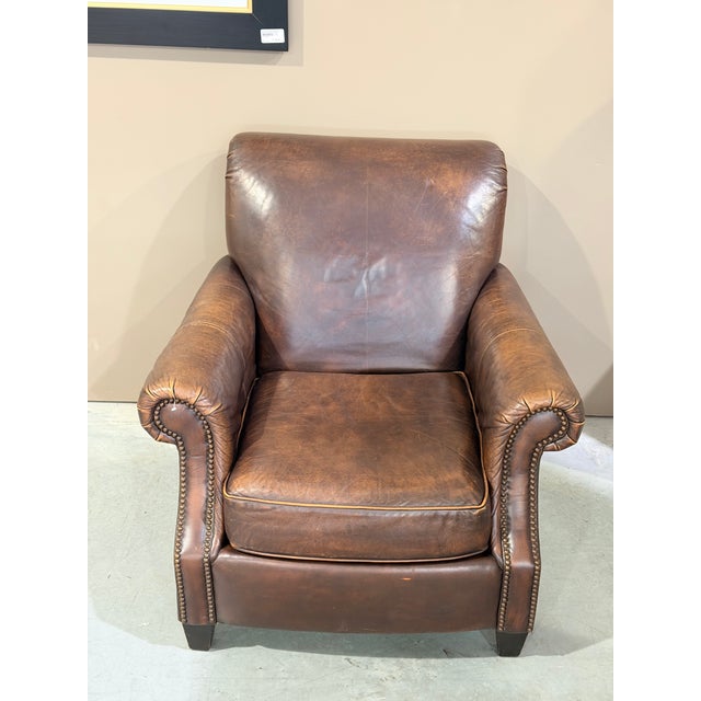 This is a classic vintage Bernhardt leather club chair, beautifully upholstered in rich brown leather with a deep,...
