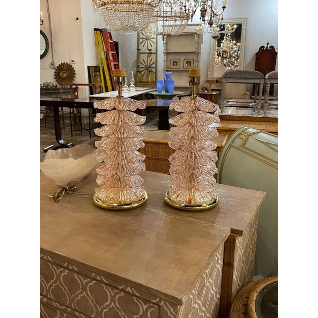 Stylish pair of modern pink Murano glass and brass lamps with ruffled glass. Creates a gorgeous upscale look!