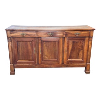 Early 20th Century French Walnut Enfilade With Three Drawers Over Three Doors For Sale