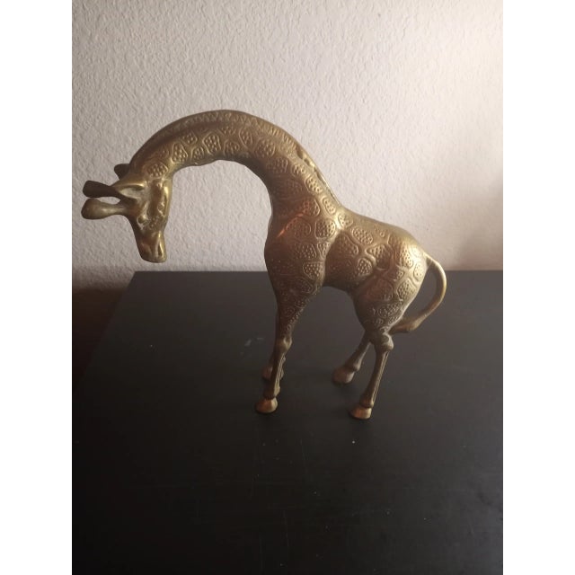 This is a Solid Hammered Brass Giraffe Figurine. Procured at an auction
