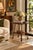 Beautiful antique Arts & Crafts style two-tier oak accent table featuring a distinctive scalloped tabletop, intricately...