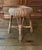 Offering an early 20th Century wood and wicker stool in very good condition. Versatile piece for plants and books.