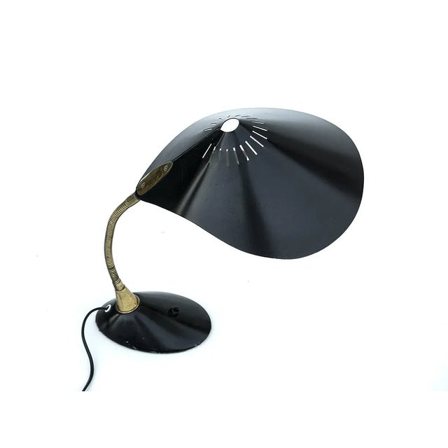 A unique lamp from the mid-twentieth century, manufactured by the German company Cosack Leuchten. The lampshade and base...