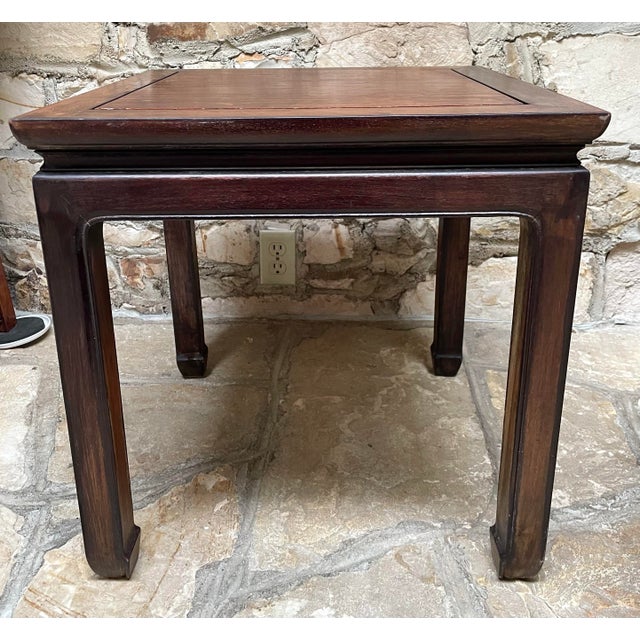 This vintage side table exemplifies the understated elegance, and exquisite craftsmanship of the Ming style. It is...