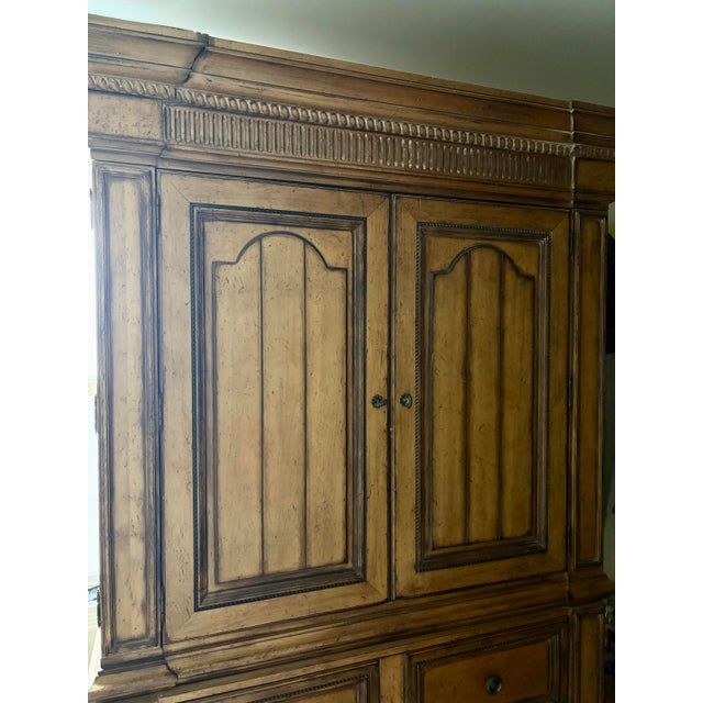 Stunning Drexel Heritage Armoire. It is a statement piece and will enhance any bedroom. The Armoire separates into 2...