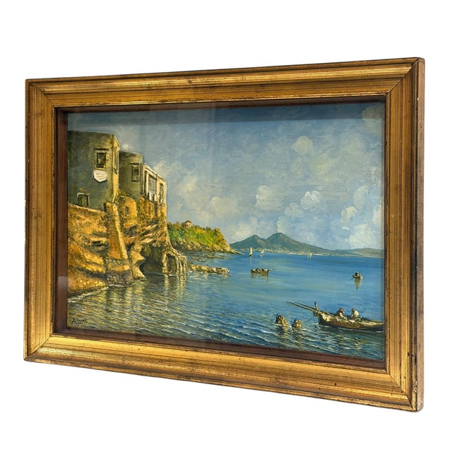 A dramatic oil on board painting depicting fishermen along a rugged rocky shoreline, presented in a deep shadowbox style...