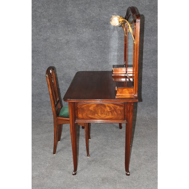 This elegant early twentieth-century French Art Nouveau vanity is a remarkable example of the movement's celebration of...