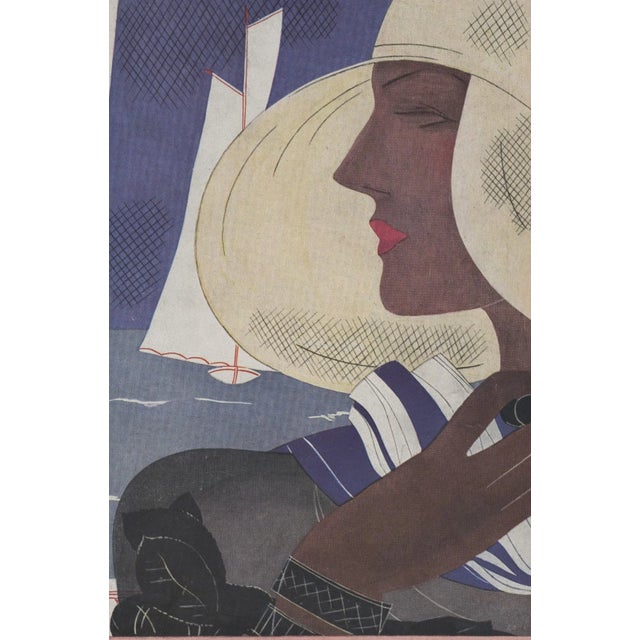 This is a wonderful French Art Deco print of a woman in profile in a wide rim sun hat with a sail boat in the background....