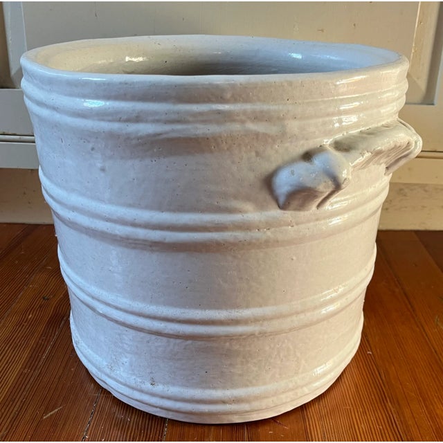 American art pottery white flower pot planter or jardiniere with applied handles. A stylized barrel with relief hoops....