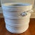 American art pottery white flower pot planter or jardiniere with applied handles. A stylized barrel with relief hoops....