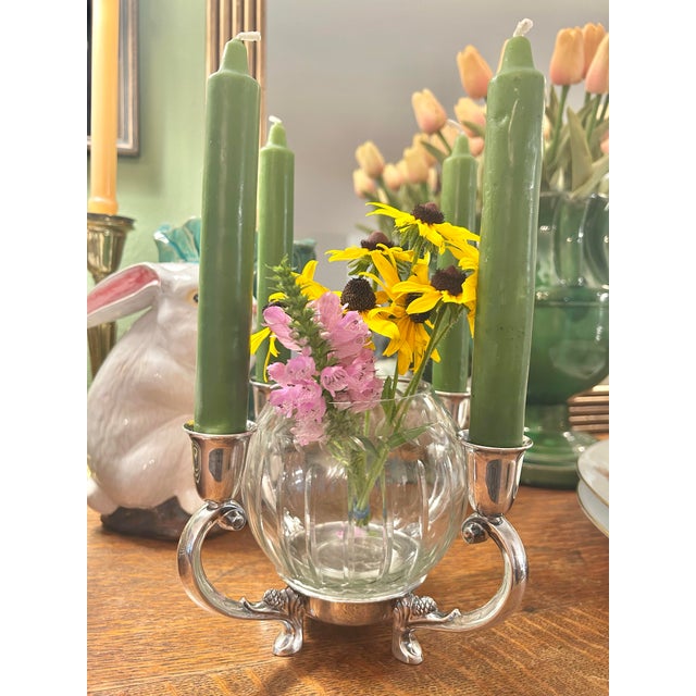 Produced in the 1940’s - 1950’s this Reed and Barton silver plate centerpiece originally held a different flower vase....