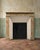 Lovely antique French "faux" wooden fireplace mantel, painted in a superb green marble with chestnut-red accents. We’ll...