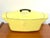 Le Creuset "La Coquelle" casserole dish designed by industrial designer Raymond Loewy in 1958. Clean inside with basket...