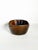 A decorative carved solid wood bowl, made in France, dating from the 1950s. Its free-flowing, organic shape, with...