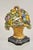 Antique Victorian Cast Iron Figural Floral Bouquet Basket Painted Door Stop. Circa Early 20th Century. Measurements: 6" H...