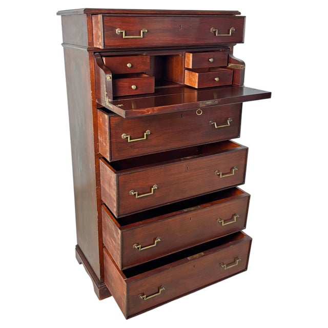 Elegant mahogany secretaire chest of drawers dating from the 20th century. This refined piece features five graduated...