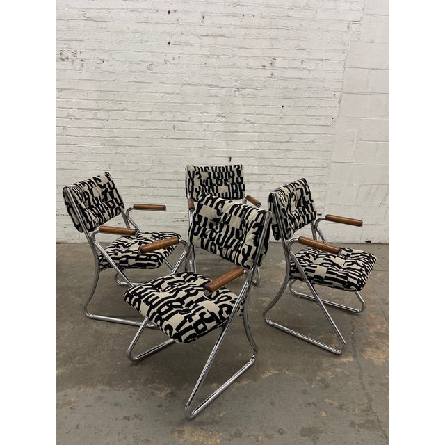 Classic comfort meets modern sophistication with this newly upholstered set of vintage DAYSTROM chrome tubular dining...