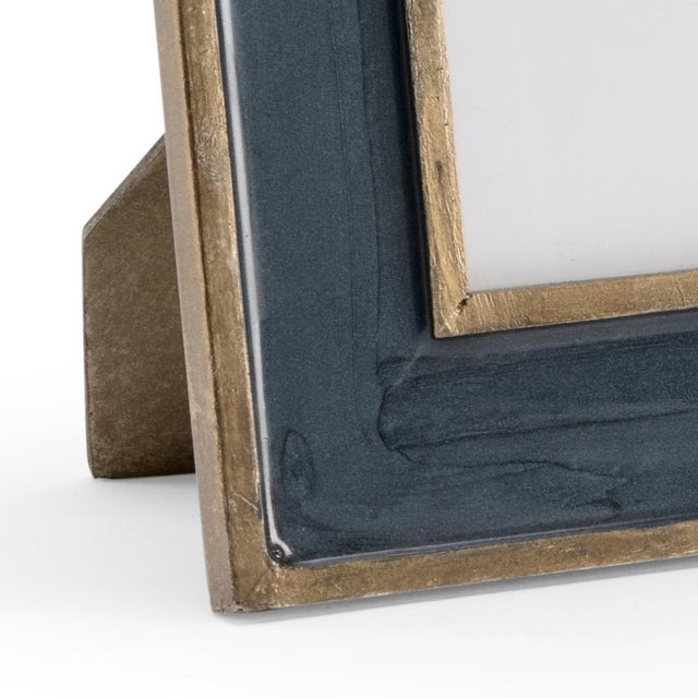 Display your favorite memory in our teal enamel frame with antique gold trim. The sleek enamel finish shines in a modern...