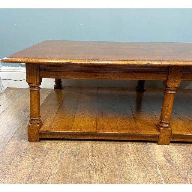 A well crafted English oak coffee table Looks like it has been modelled on a classic refectory table with the hand turned...