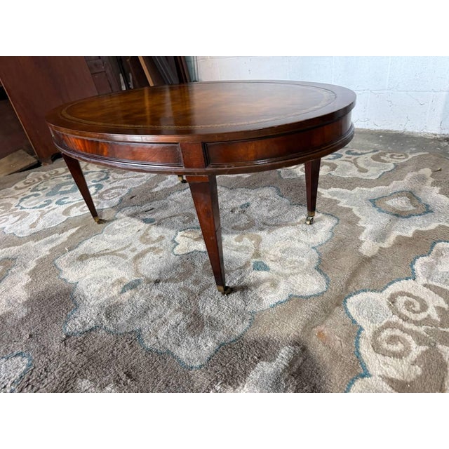Weiman Vintage Regency Style Oval Leather Top Flame Mahogany Coffee Table on Casters. By Weiman. For Sale - Image 4 of 11