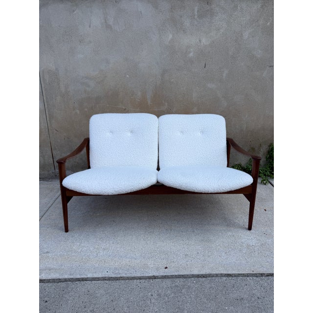 Amazing 711 Settee by Frederik Kayser. Faux shearling uphostery redone at some point, in good condition.