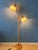 Vintage Steinhauer mushroom floor lamp crafted from wood with beige acrylic glass shades. The acrylic glass diffusers...