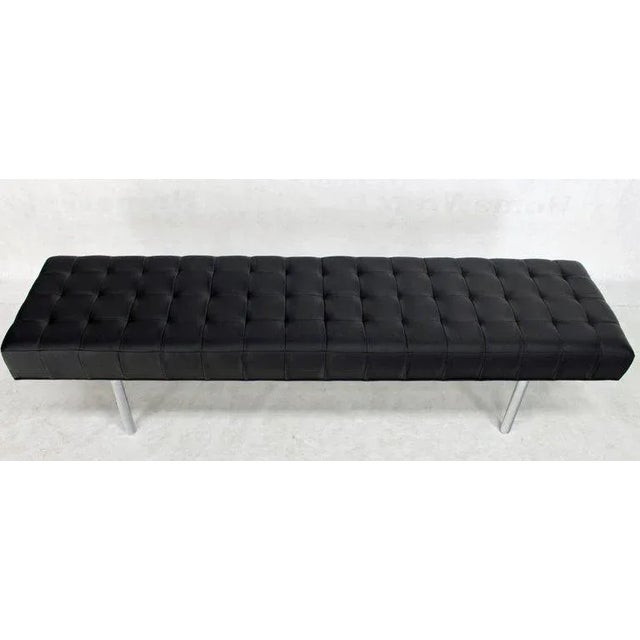Mid-Century Modern long black tufted upholstery bench, or almost narrow daybed.