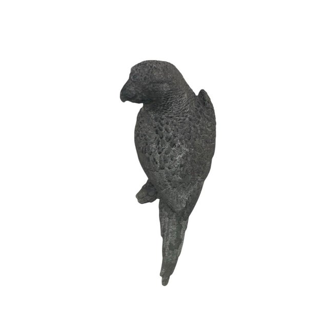 Add a touch of storied, sculptural interest to your walls with this striking vintage parrot. Expertly crafted from solid...