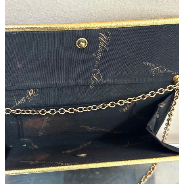 1950s Whiting & Davis black/gold metal mesh evening purse/clutch w/ hideaway gold chain strap. Some very mild signs of...
