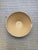 Large vintage French tian bowl in terracotta with a soft pale-yellow glaze and a small pouring lip. Traditionally used in...