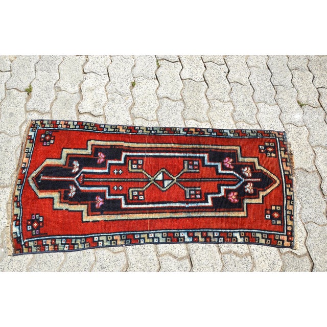 This is a vintage Turkish Oushak rug from the 1960s. The piece was hand-knotted.