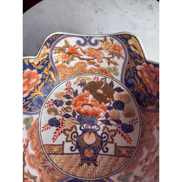 Ink Blue Antique Japanese Imari Porcelain Bowl | Meiji Period | Lobed Form | Flower Basket & Phoenix Panels For Sale - Image 8 of 8