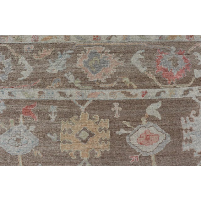 Turkish Oushak Rug With All-Over Floral Design on a Light Brown Field For Sale - Image 9 of 12
