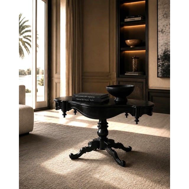 Black lacquered guitar table, Louis Philippe period. Walnut coffee table, second half of the 19th century. Deep black...