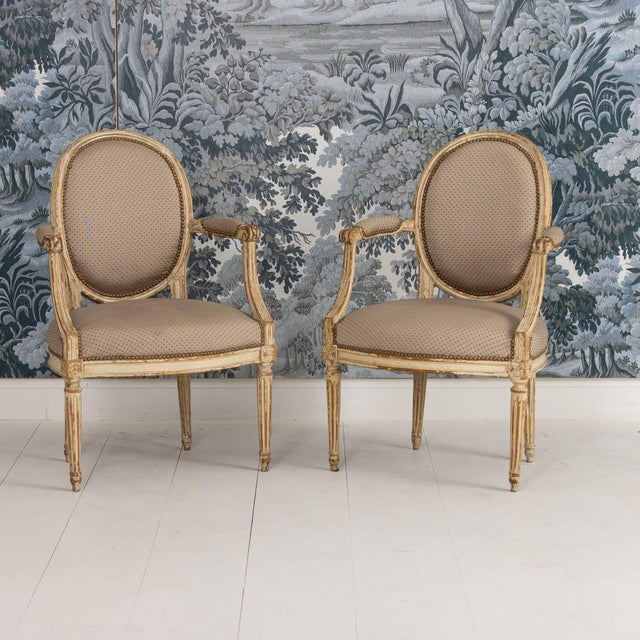 A rare pair of 18th c. French Louis XVI fauteuils in original paint by Pierre REMY (1724-98). Chairs are circa 1780....