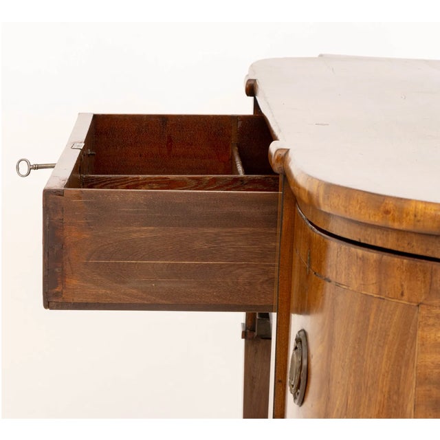 George III Figured Mahogany Bowfront Sideboard With Cellarette Drawers | England, Circa 1800 For Sale - Image 9 of 10
