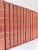 A handsome decorative library set of John L. Stoddard’s famous travel lecture books. Bound in rich red cloth with gilt...