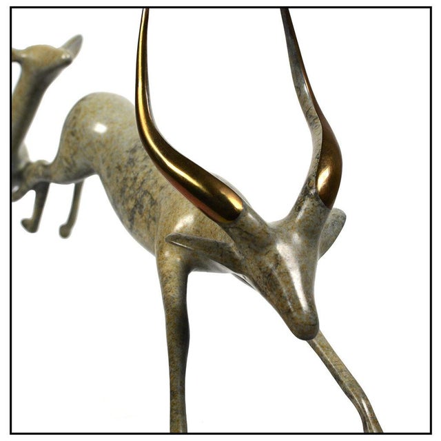 The artwork here, "Impalas Running", is a wonderful depiction of a male and female mates, that is saturated with acute...