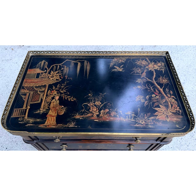 A three drawer chest, commode, nightstand or end table in the Chinoiserie Style. A wonderfully painted decorative chest...