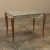 Mid-Century French Mirrored Coffee Table is a superb blend of natural wood with contoured mirrors that creates a graceful...