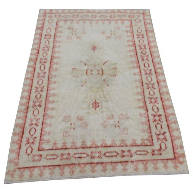 Hand-knotted with care using traditional rug-making techniques, this wool rug blends timeless craftsmanship with a modern...