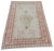 Hand-knotted with care using traditional rug-making techniques, this wool rug blends timeless craftsmanship with a modern...