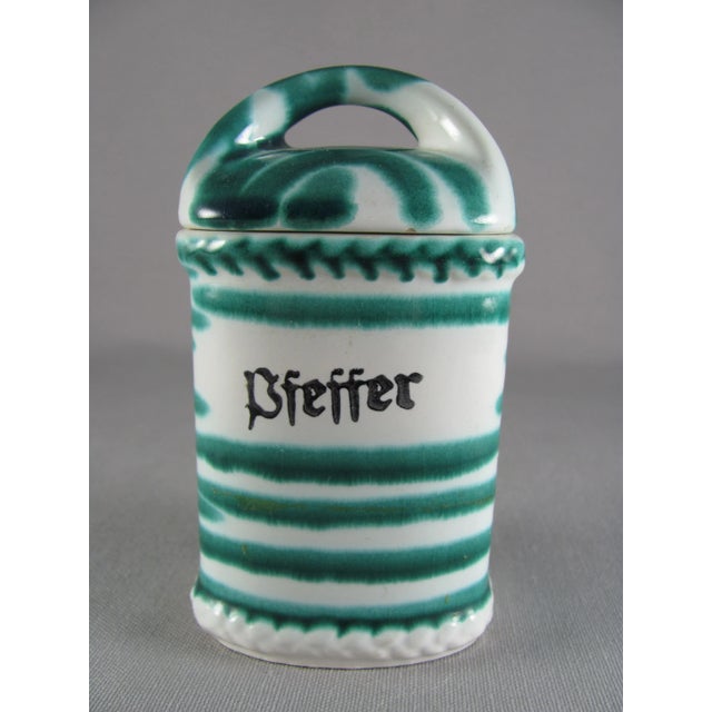 No chips nor cracks nor crazing Discolored scuffing on underside bottom unglazed foot and underside bottom unglazed lid...