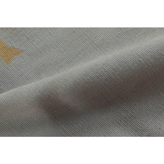 Contemporary Abusson style floral wool rug by Thomas Jayne for Doris Leslie Blau. Size: 4'10" × 8'1" (147 × 246 cm)...