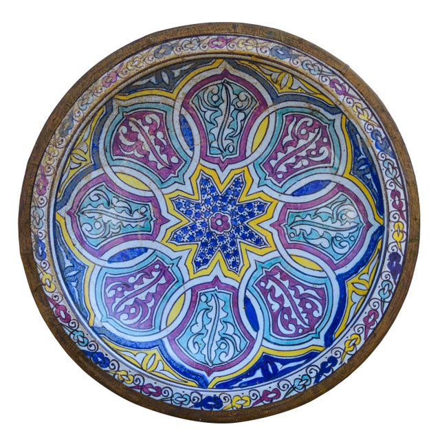 Handcrafted and glazed ceramic plate. Features an intricate hand-painted Moorish pattern in a traditional Andalusian color...