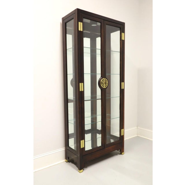 An Asian Chinoiserie style curio cabinet by American of Martinsville. Solid highly polished mahogany, decorative...